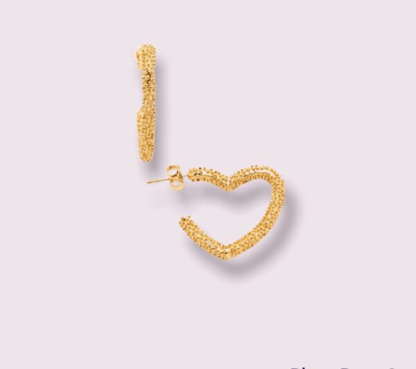 Découvrez nos boucles d'oreilles coeur de type créoles