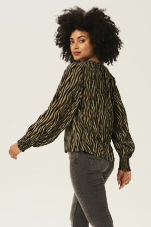 Découvrez la blouse jungle