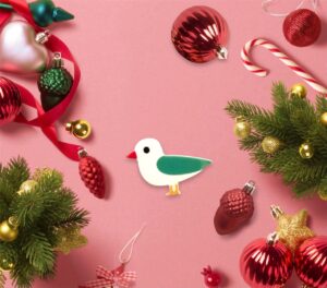 Découvrez notre broche mouette blanche et verte
