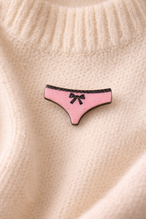 Broche culotte rose noeud noir pailletée