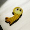 Broche méduse jaune pailletée