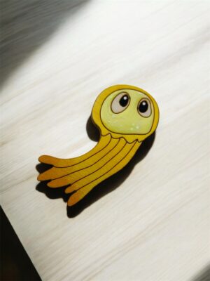 Broche méduse jaune pailletée