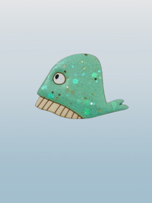 Laissez-vous charmer par notre broche baleine verte pailletée, une pièce artisanale originale qui raconte une véritable histoire de famille