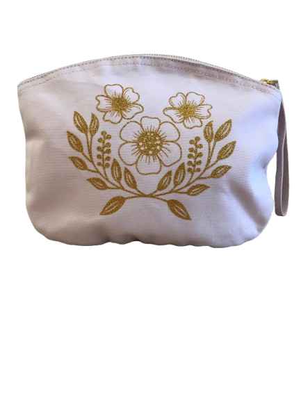 Apportez une touche de douceur et d'élégance à votre quotidien avec notre trousse de toilette rose pastel - motif floral doré pailleté.