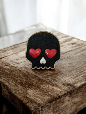 Broche tête de mort noire