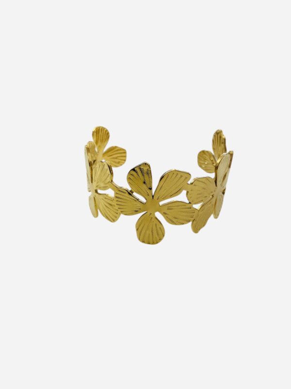 Craquez pour notre jonc fleurs dorées en acier