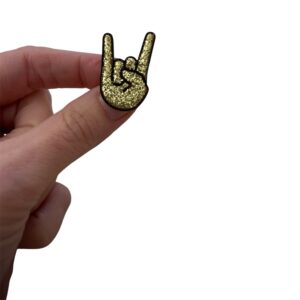Broche corne du diable dorée pailletée